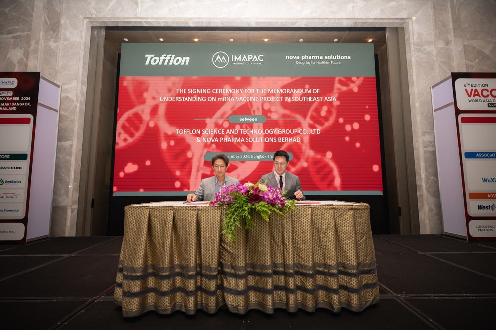 conference stage floral at a corporate event at Amari Bangkok, Bangkok, Thailand — managed by Niramit Creations.