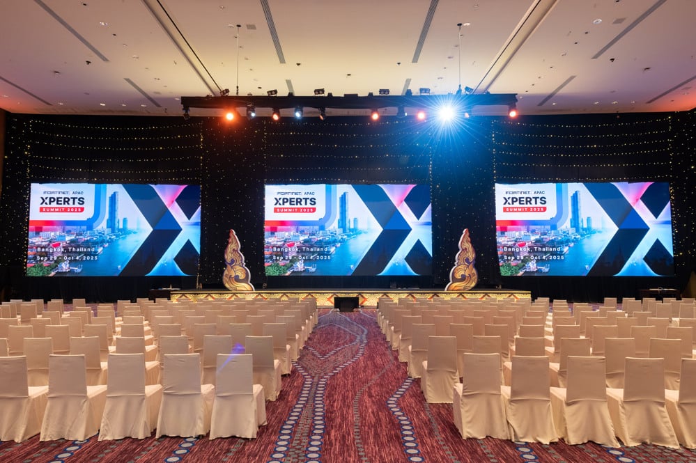 conference stage branded screens at a corporate event at AVANI+ Riverside Bangkok, Bangkok, Thailand — managed by Niramit Creations.