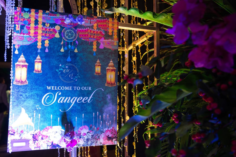 Sangeet colorful led stage at an Indian wedding at Banyan Tree Phuket, Phuket, Thailand — planned by Niramit Creations.