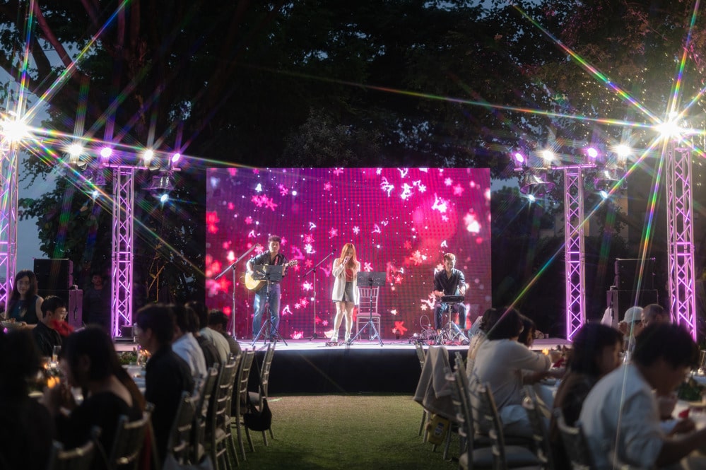 stage pink lighting night at a corporate event at Capella Bangkok, Bangkok, Thailand — managed by Niramit Creations.