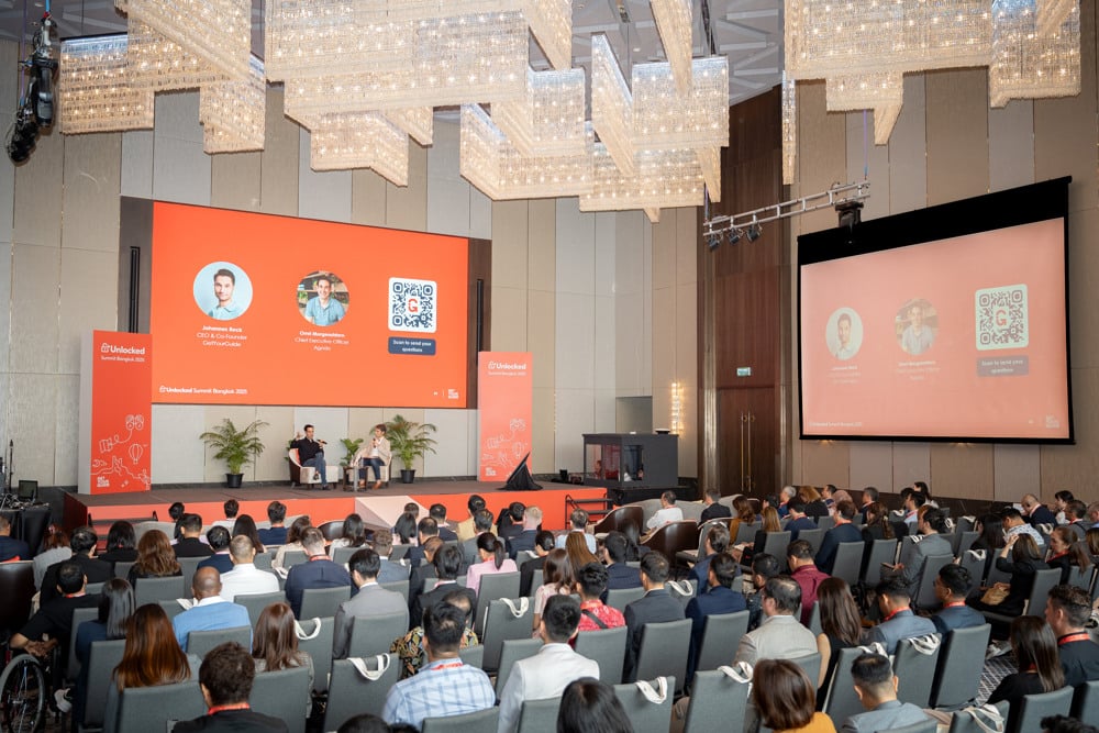 GetYourGuide Unlocked Summit corporate event summit main stage at Chatrium Grand Bangkok, planned and managed by Niramit Creations Thailand.