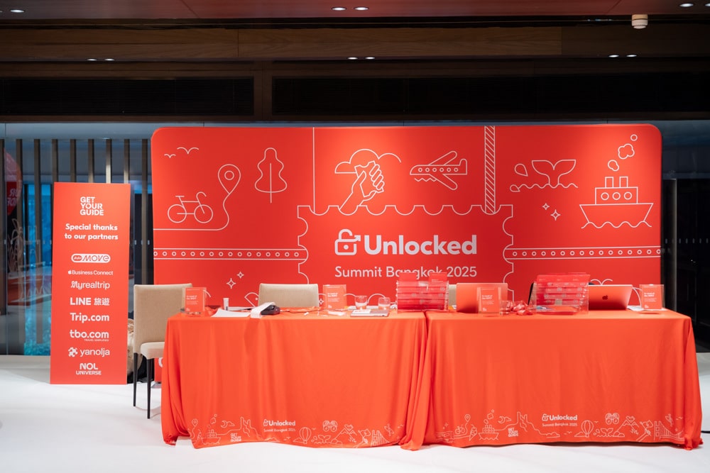 GetYourGuide Unlocked Summit corporate event summit main stage at Chatrium Grand Bangkok, planned and managed by Niramit Creations Thailand.