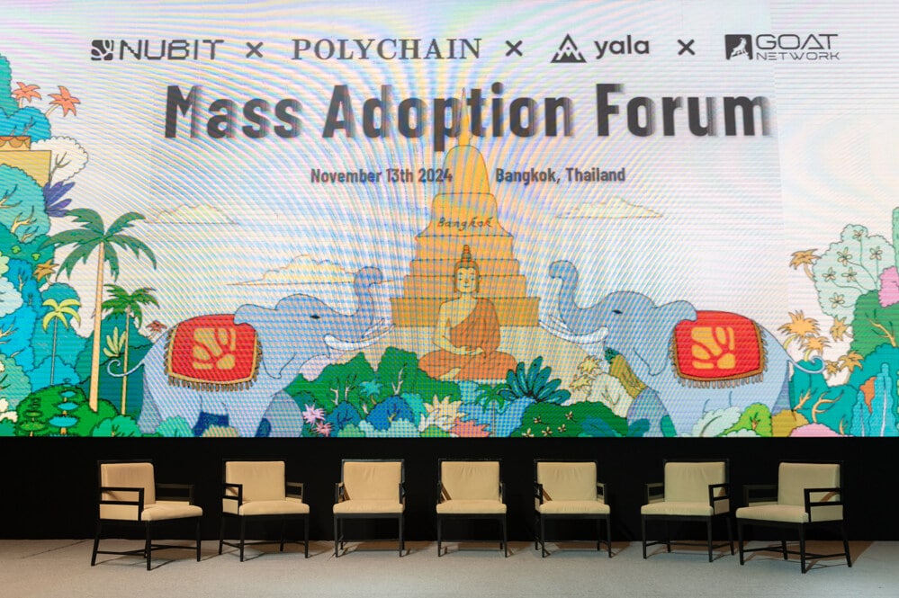 conference stage branded backdrop at a corporate event at Conrad Bangkok, Bangkok, Thailand — managed by Niramit Creations.