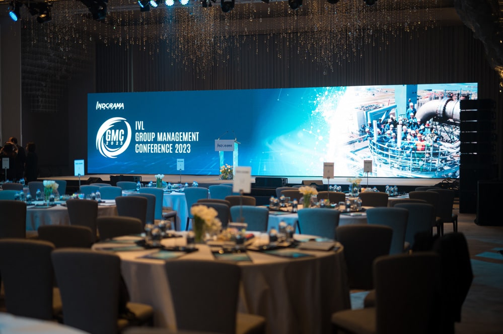 conference stage screens banquet at a corporate event at Four Seasons Hotel Bangkok, Bangkok, Thailand — managed by Niramit Creations.