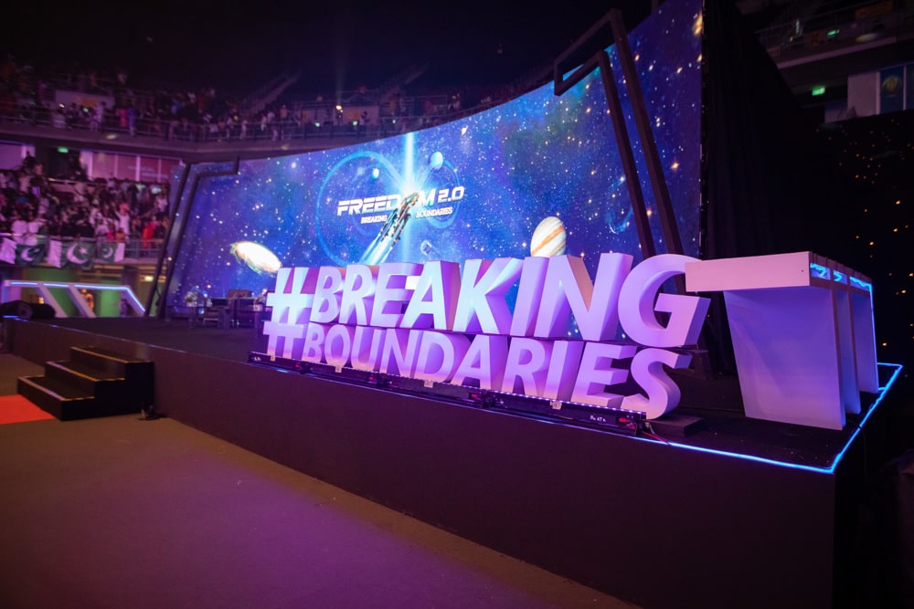 Corporate business convention stage signage at IMPACT Challenger Bangkok, managed by Niramit Creations Thailand.