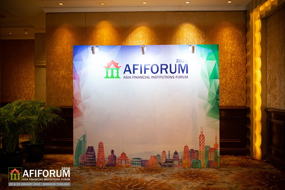 conference stage branded backdrop at a corporate event at InterContinental Bangkok, Bangkok, Thailand — managed by Niramit Creations.