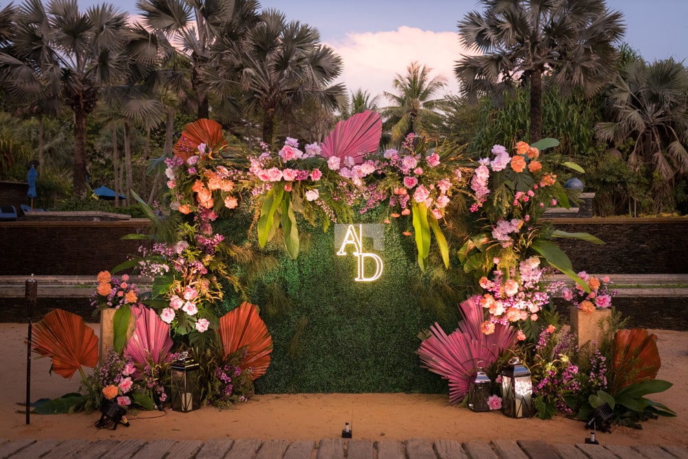 Mehndi colorful floral stage at an Indian wedding at JW Marriott Phuket Resort & Spa, Phuket, Thailand — planned by Niramit Creations.