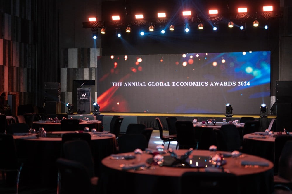 The Annual Global Economics Awards 2024 — ballroom stage tables at W Bangkok Hotel, Bangkok. Corporate event by Niramit Creations Thailand.